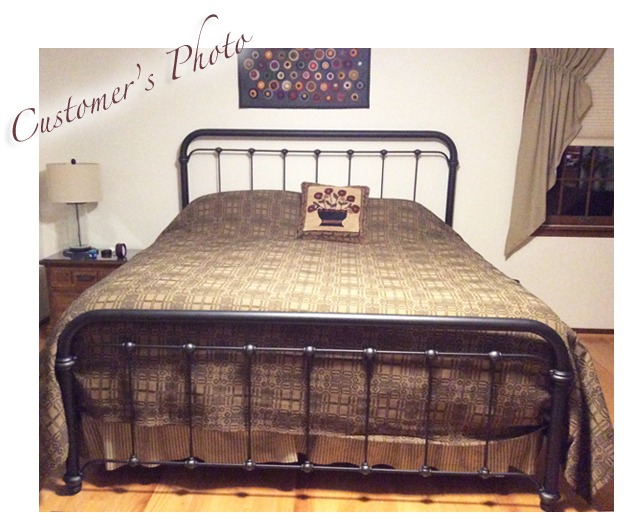 Paula's classic bedroom with iron bed
