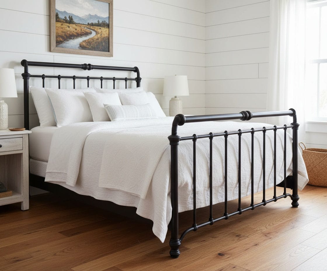 Sheffield handcrafted iron bed frame showing structural castings and classic vertical bar design